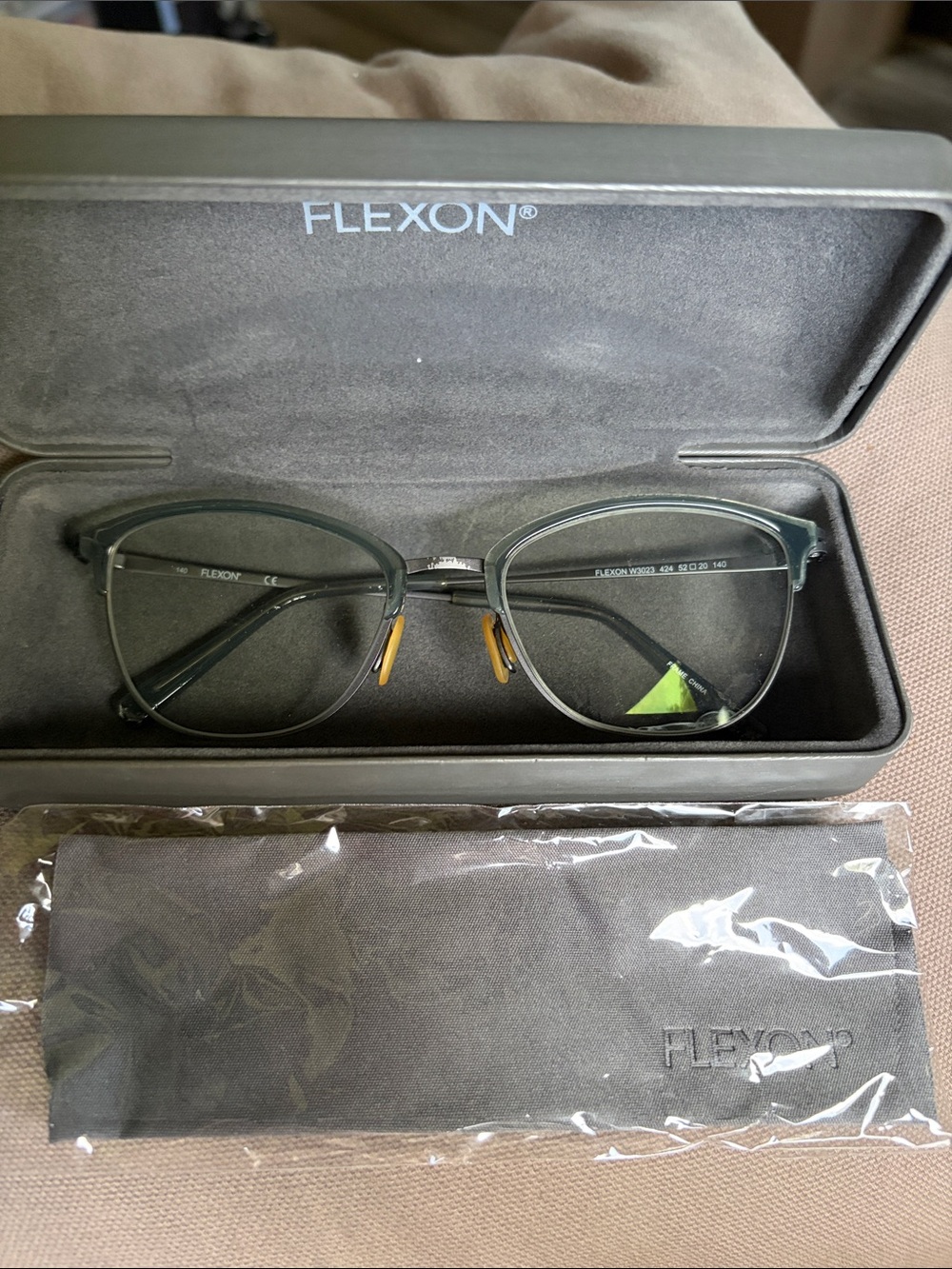 FLEXON Eyeglasses and case (LENS will need to be replaced)